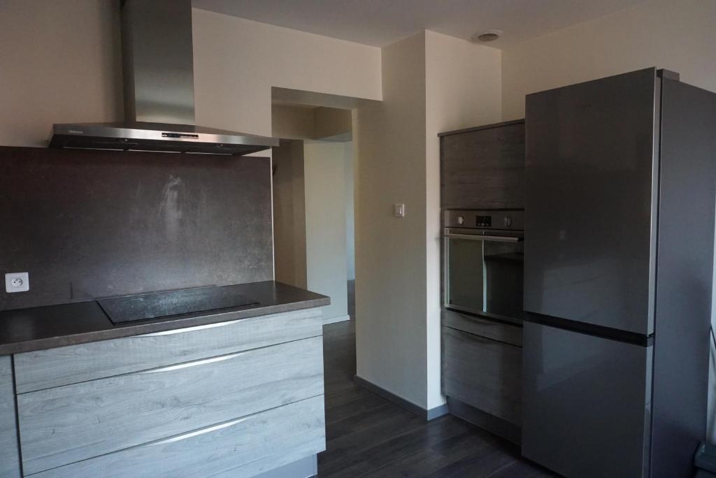 Kuchyň nebo kuchyňský kout v ubytování L'Aubach - appartement spacieux - au pied du vignoble - parking gratuit