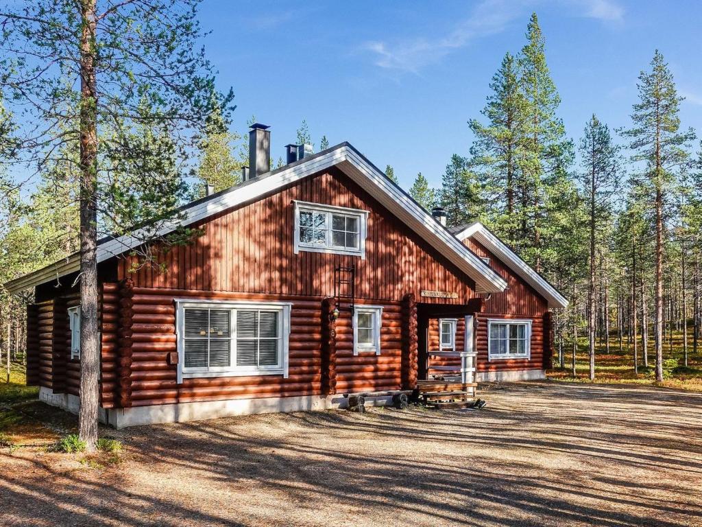 a log cabin in the middle of the woods at Holiday Home Kiepinkulma a by Interhome in Levi