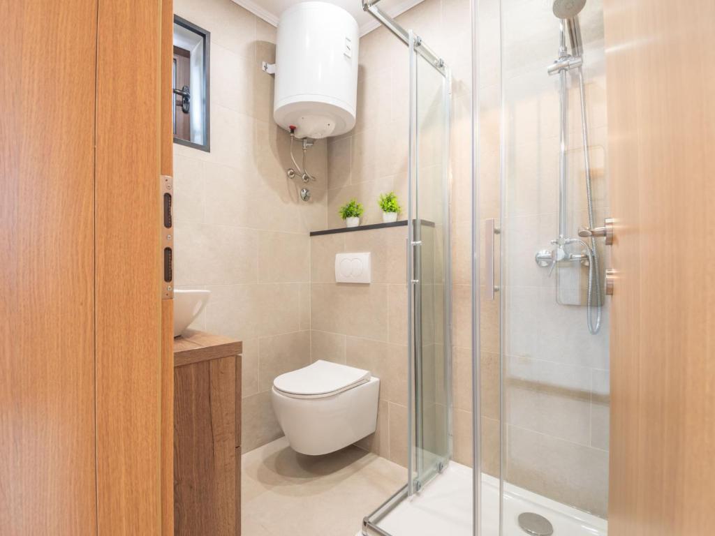 Koupelna v ubytování Holiday Home Nada by Interhome
