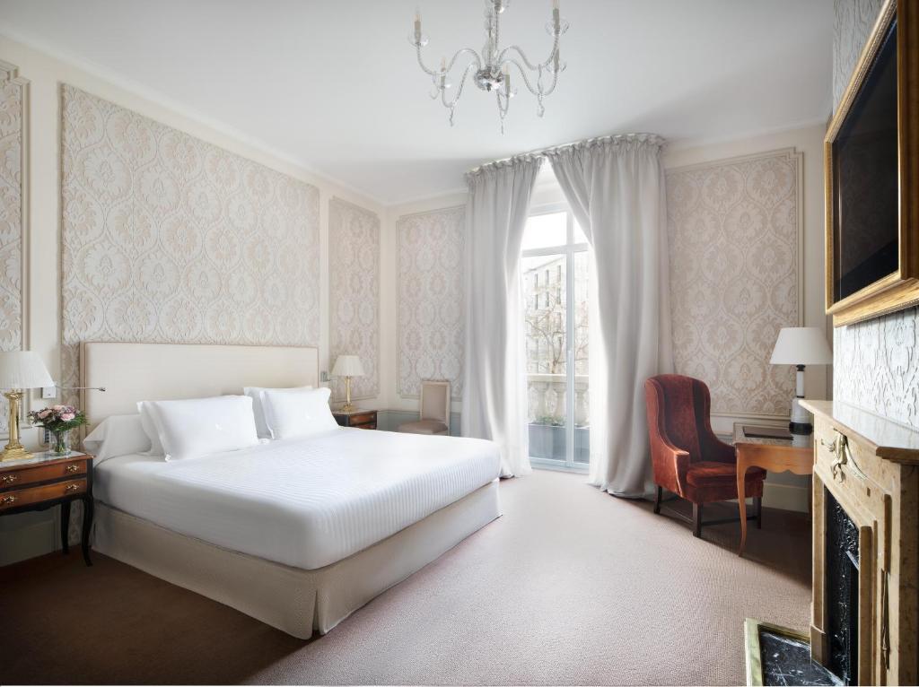 Postel nebo postele na pokoji v ubytování Hotel El Palace Barcelona