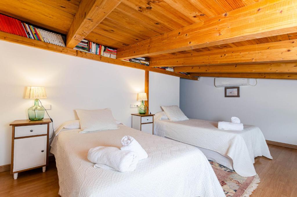 Postel nebo postele na pokoji v ubytování YourHouse Can Rosillo Villa