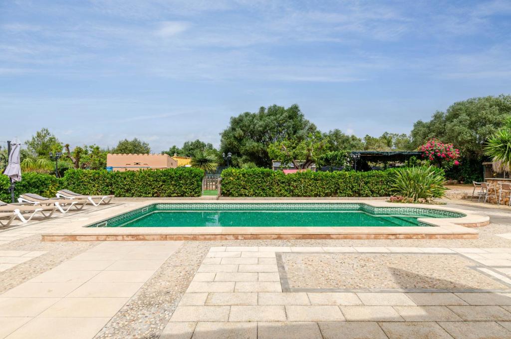Bazén v ubytování YourHouse Can Rosillo Villa nebo v jeho okolí