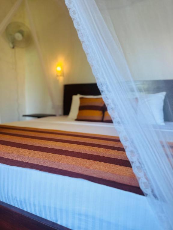 Postel nebo postele na pokoji v ubytování Ella Festoon