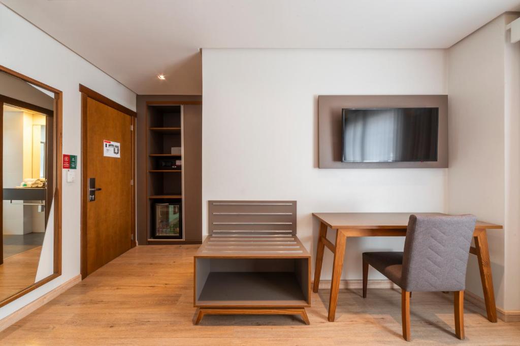 Kuchyň nebo kuchyňský kout v ubytování Hotel Laghetto Stilo Centro