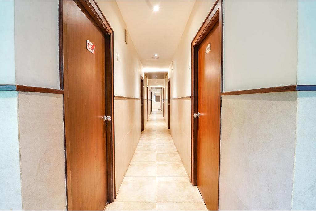 Fotografie z fotogalerie ubytování FabHotel Karpagam - 900m from Nehru Stadium v destinaci Kójamputtúr