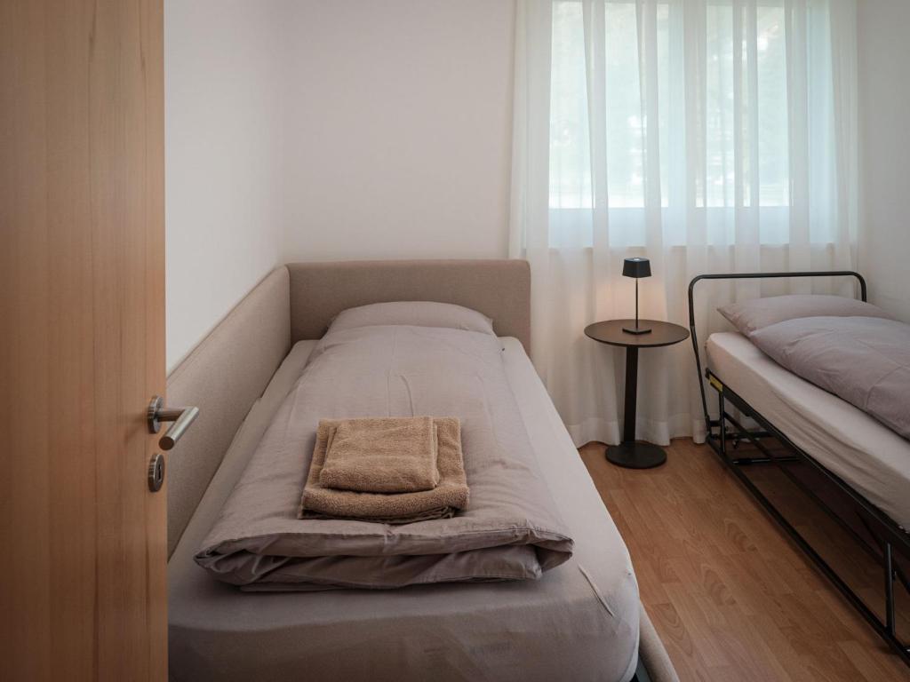 Postel nebo postele na pokoji v ubytování Apartment Davinci-2 by Interhome