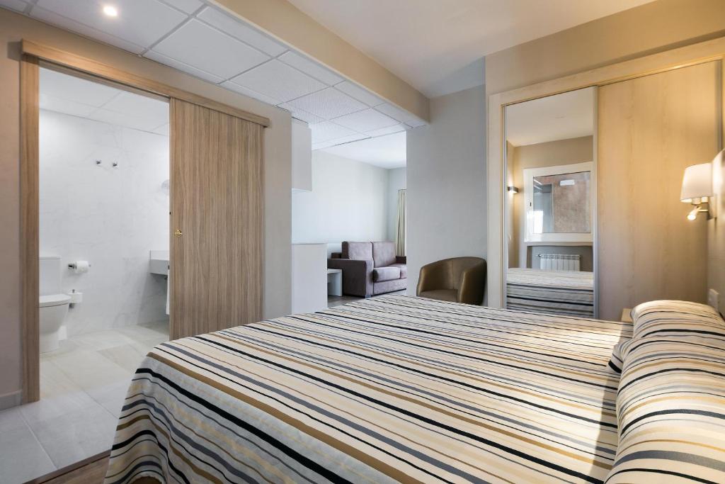 Postel nebo postele na pokoji v ubytování Hotel Best Da Vinci