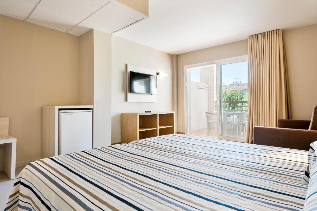 TV a/nebo společenská místnost v ubytování Hotel Best Da Vinci