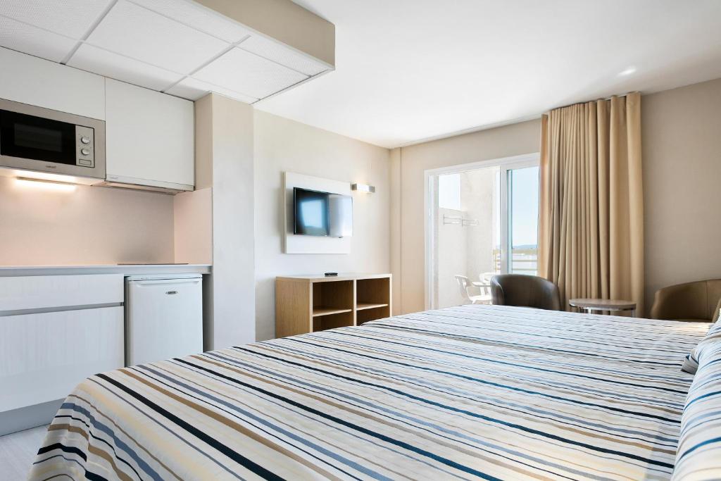 Postel nebo postele na pokoji v ubytování Hotel Best Da Vinci