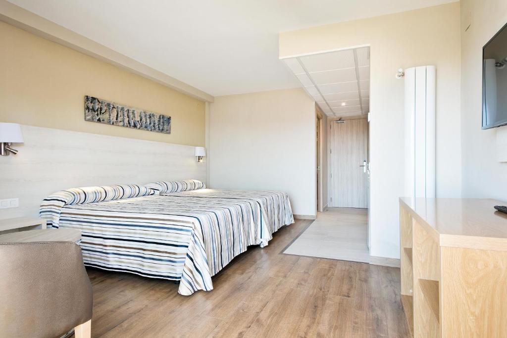 Postel nebo postele na pokoji v ubytování Hotel Best Da Vinci