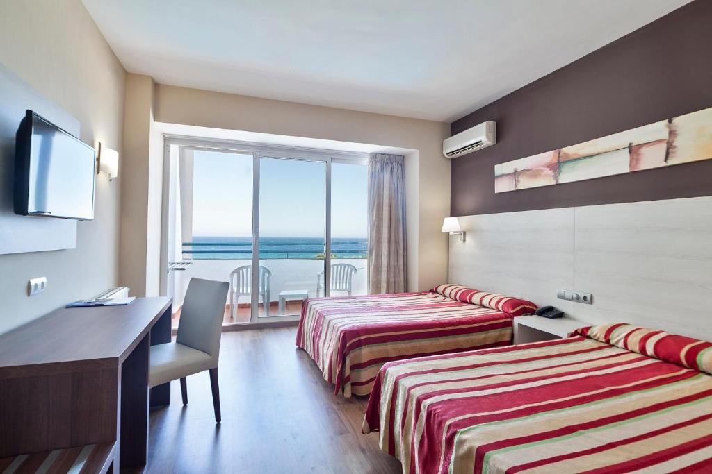 Postel nebo postele na pokoji v ubytování Hotel Best Indalo