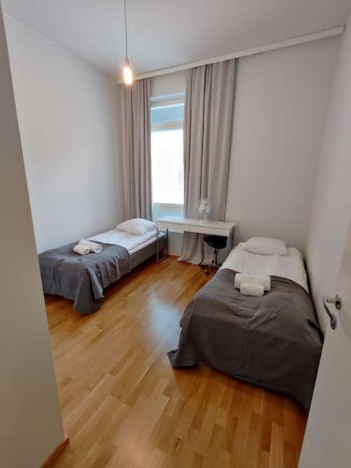 Hotelli Kalustettu Kolmio saunalla Hotelli