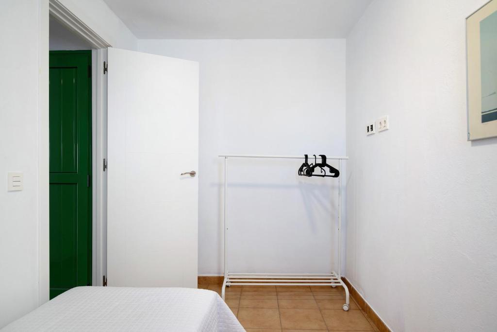 Postel nebo postele na pokoji v ubytování San Roque 2