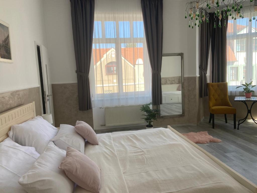 Postel nebo postele na pokoji v ubytování Penzión Bihari