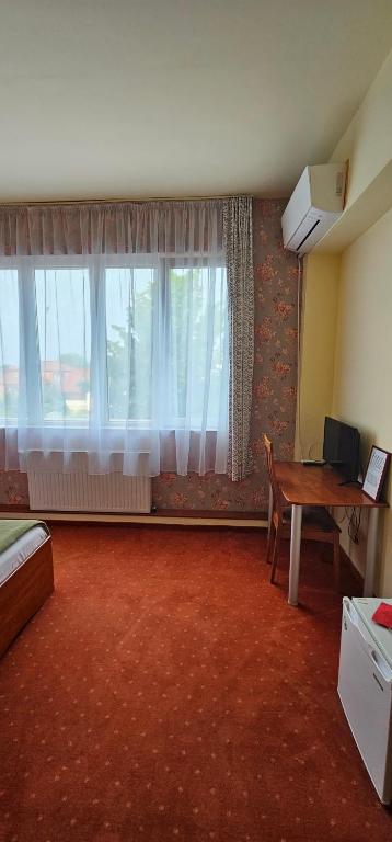TV a/nebo společenská místnost v ubytování Hotel Olimp