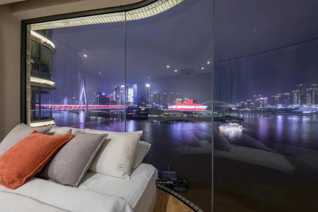 Fotografie z fotogalerie ubytování Baihong Riverview Apartment-Hongya Cave v destinaci Čchung-čching