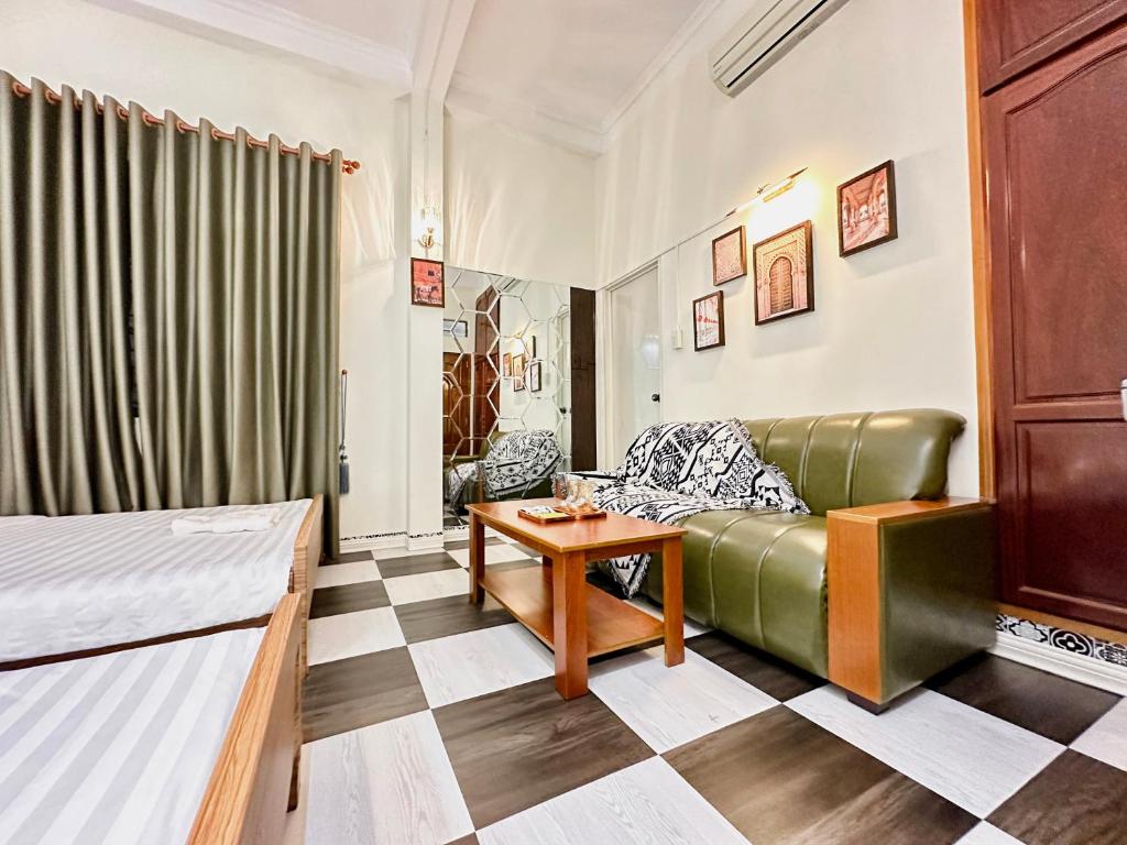 BÊ TÔNG RESIDENCES HOMESTAY tesisinde bir oturma alanı