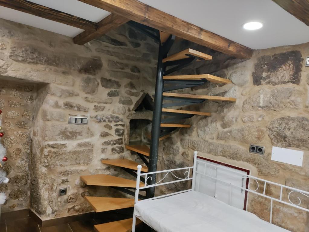 A bed or beds in a room at Casa al lado del mar