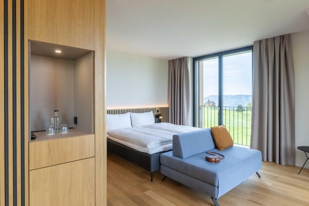 Letto o letti in una camera di Stoos Lodge