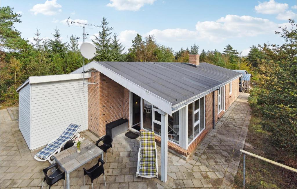 an overhead view of a house with a roof at Lovely Home In Fjerritslev With Wifi in Fjerritslev