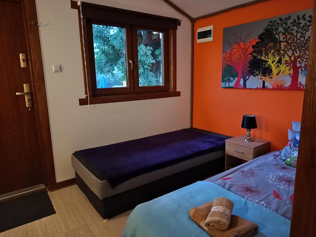 Postel nebo postele na pokoji v ubytování Dolina Rosy