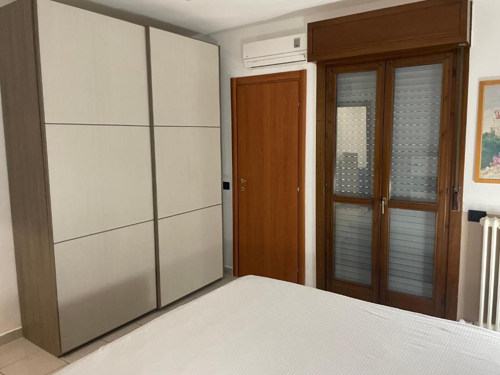 Postel nebo postele na pokoji v ubytování Casa Pompei