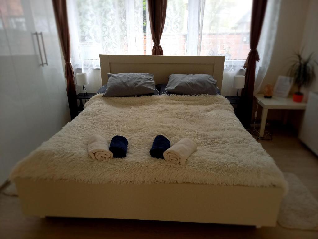 Posteľ alebo postele v izbe v ubytovaní Idill Üdülőház 2