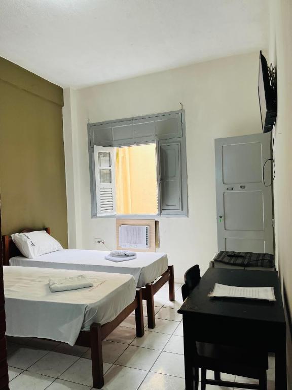 Hotel América - Sala Quadruplo Deluxe