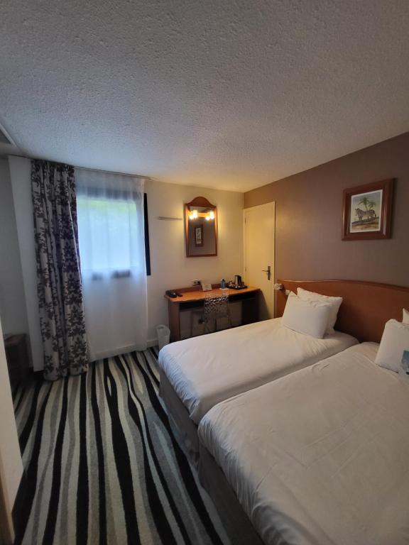 Kyriad Saint Quentin en Yvelines - Montigny - 2 Eenpersoonsbedden 1 Juniorbed (tot 10 Jaar)