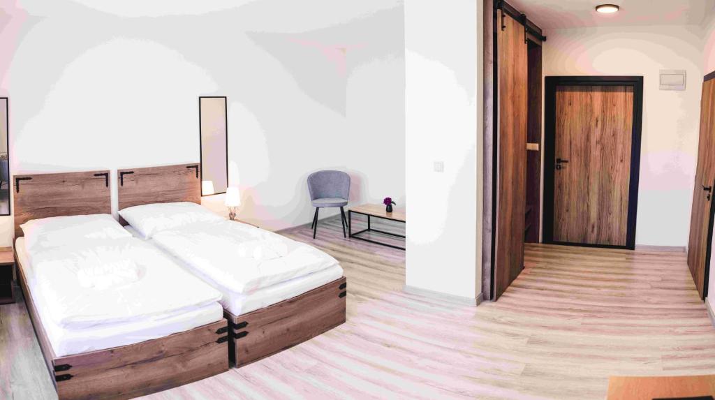 Letto o letti in una camera di Penzion Kamence