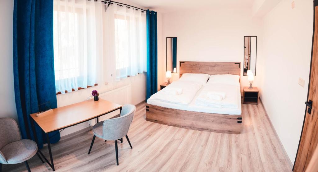 Letto o letti in una camera di Penzion Kamence