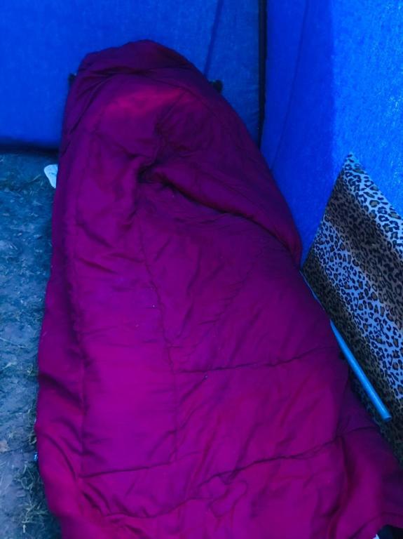 a pink sleeping bag sitting on top of a tent at Imighlad in Marrakech