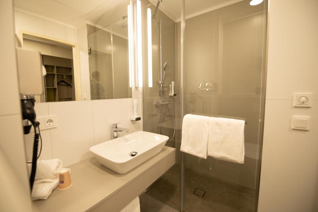 Koupelna v ubytování th Hotel Leipzig Messe