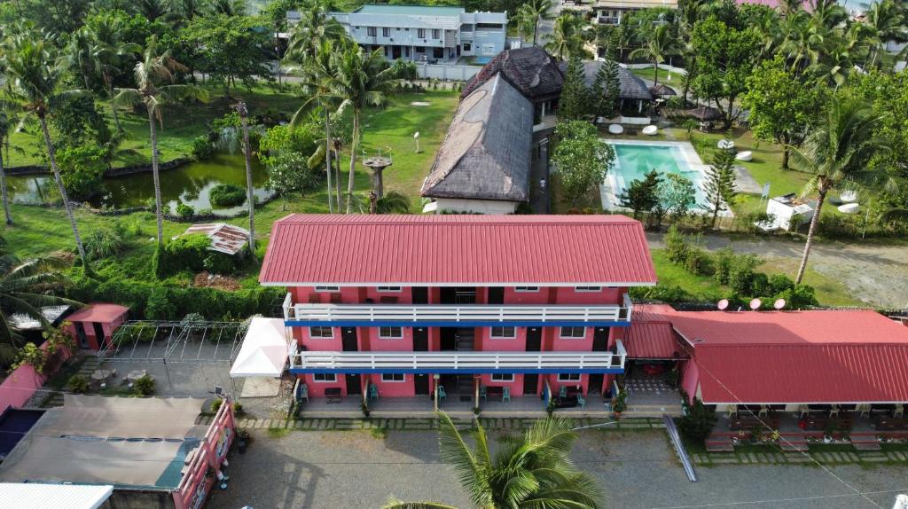 an overhead view of a house with a red roof at Jamjens Lodge powered by Cocotel in Baler