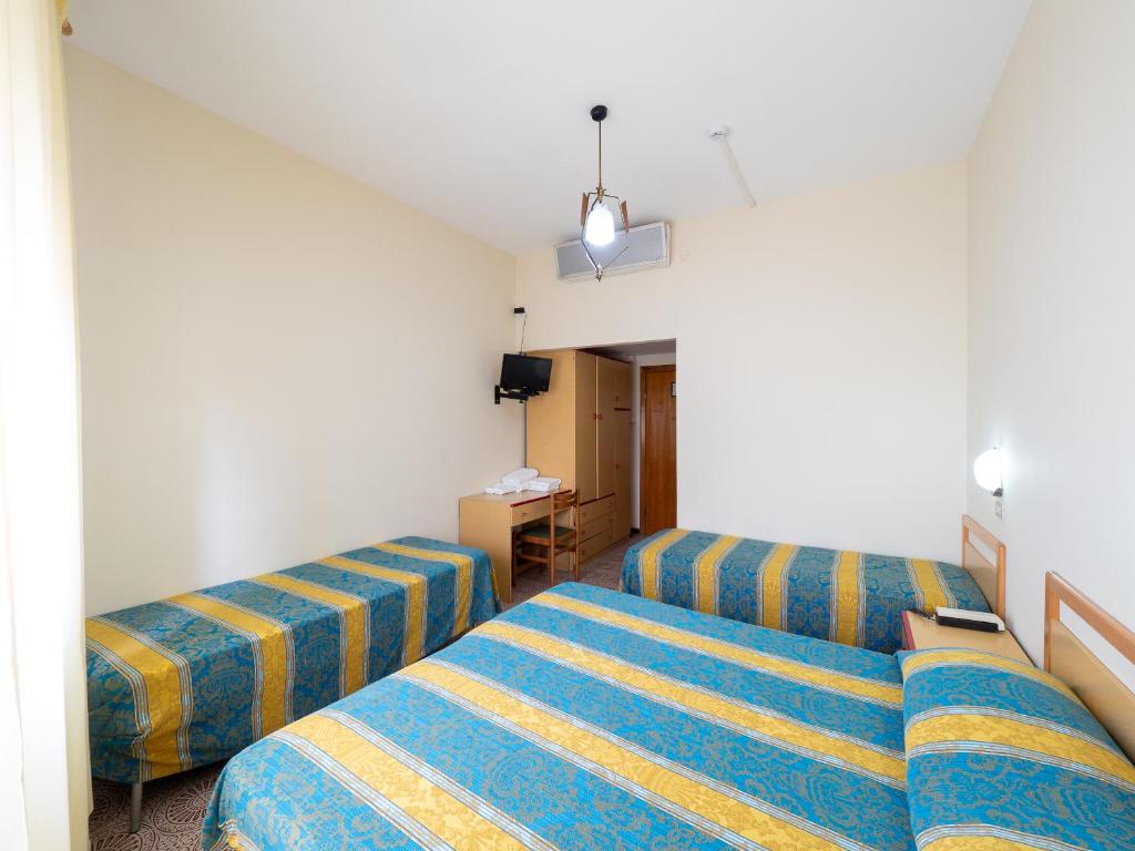 Postel nebo postele na pokoji v ubytování Hotel Blurelda