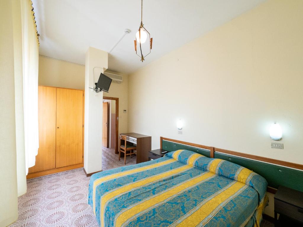 Postel nebo postele na pokoji v ubytování Hotel Blurelda