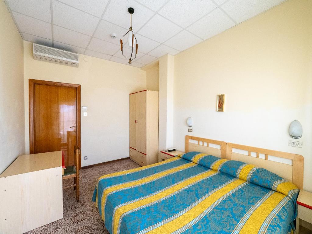 Postel nebo postele na pokoji v ubytování Hotel Blurelda