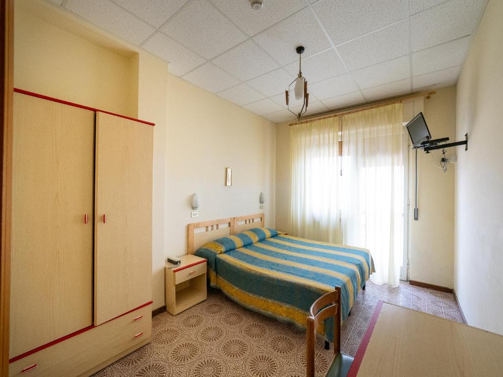 Postel nebo postele na pokoji v ubytování Hotel Blurelda