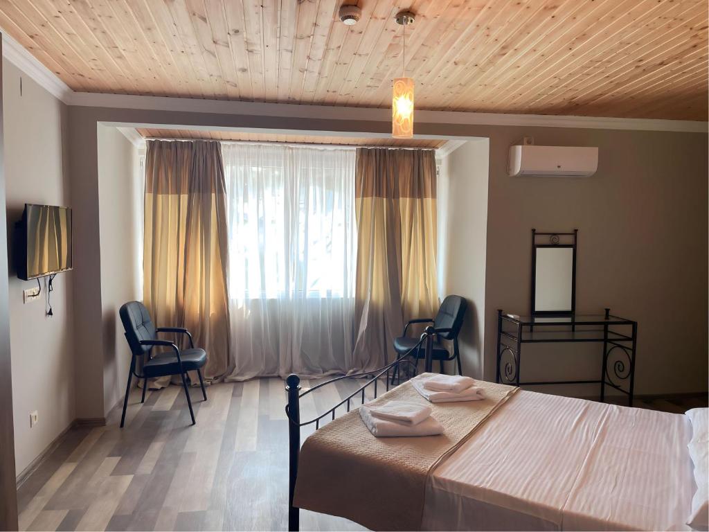 Postel nebo postele na pokoji v ubytování Argo Hotel