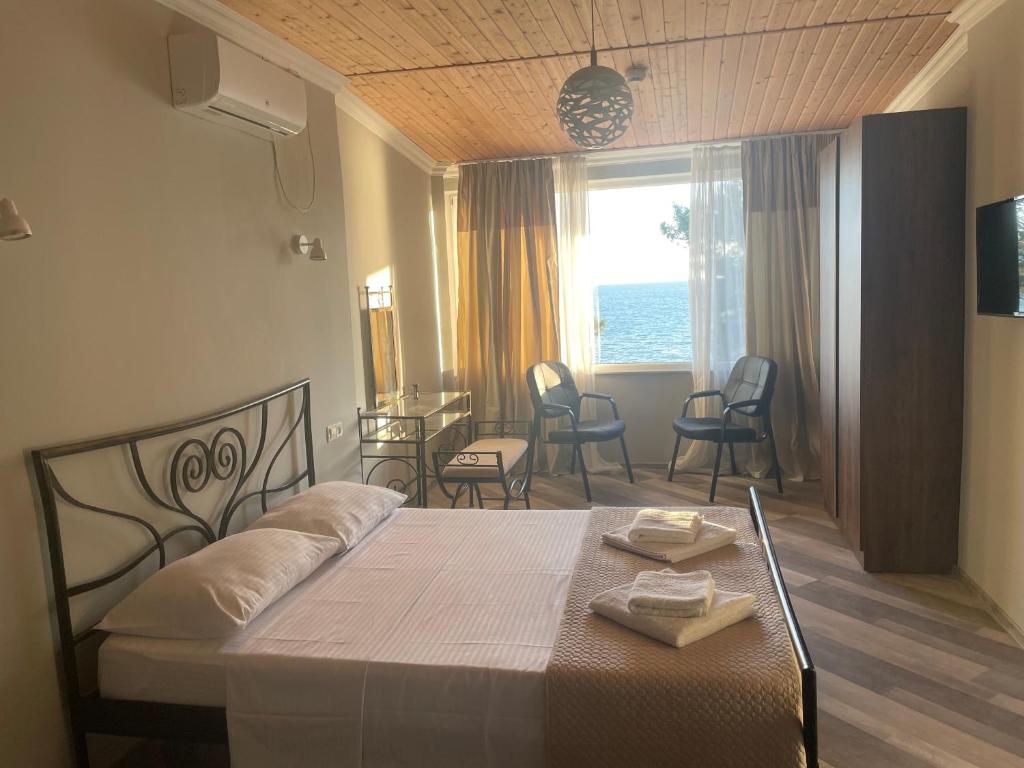 Postel nebo postele na pokoji v ubytování Argo Hotel