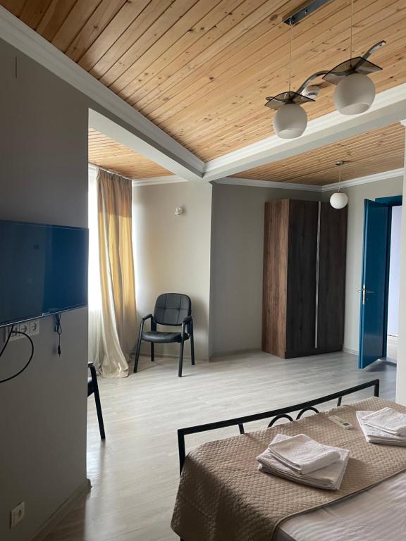 Postel nebo postele na pokoji v ubytování Argo Hotel