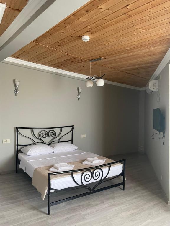 Postel nebo postele na pokoji v ubytování Argo Hotel
