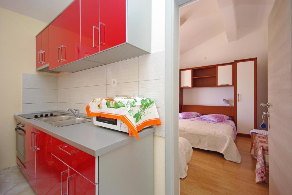 Posteľ alebo postele v izbe v ubytovaní Apartments Ribarević