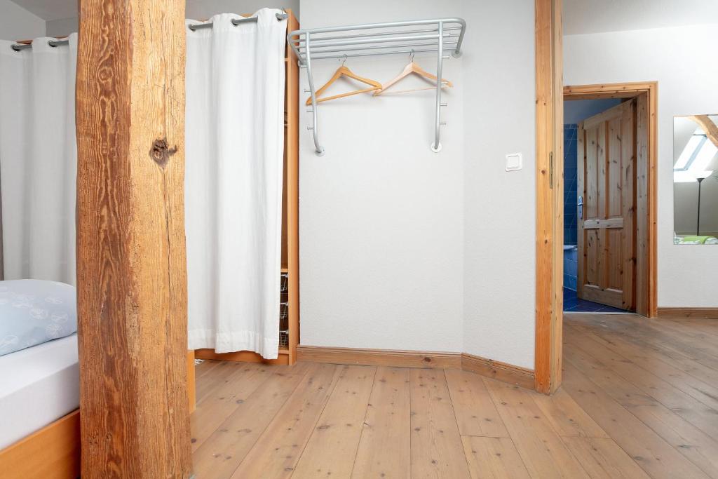 Postel nebo postele na pokoji v ubytování Gutshaus Ketelshagen