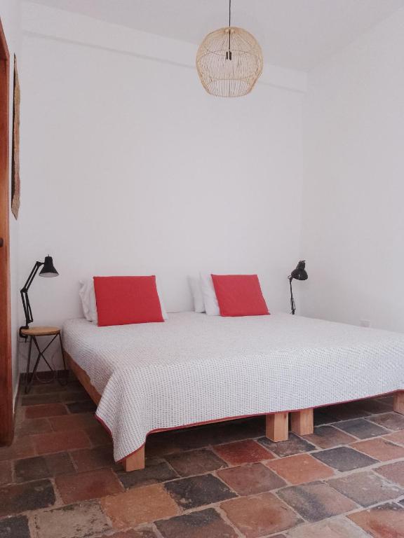 Postel nebo postele na pokoji v ubytování Casita de Piedra
