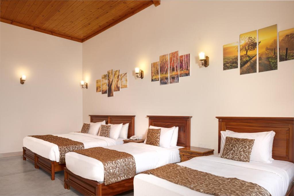 Postel nebo postele na pokoji v ubytování Hotel Cassendra