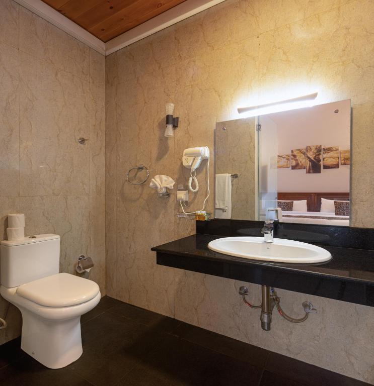 Koupelna v ubytování Hotel Cassendra