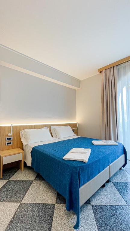 Postel nebo postele na pokoji v ubytování Agri-Hotel Da Marianna Resort & Spa