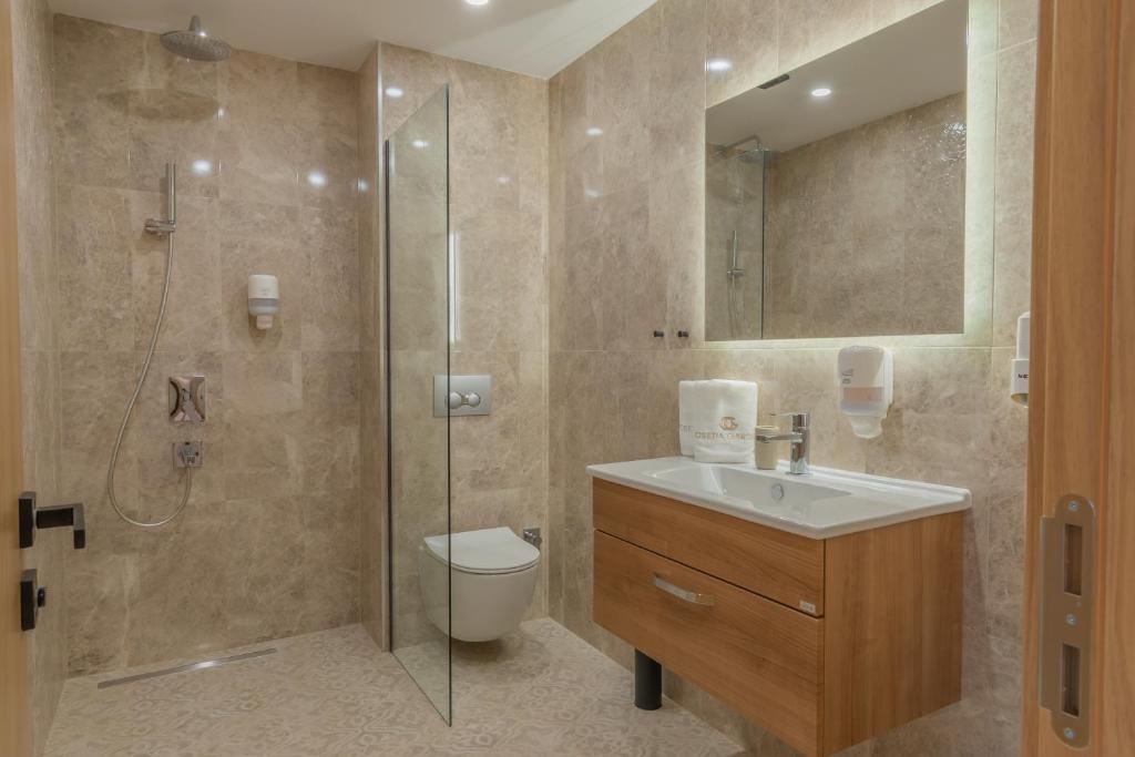 Koupelna v ubytování Hotel Osetia Garden
