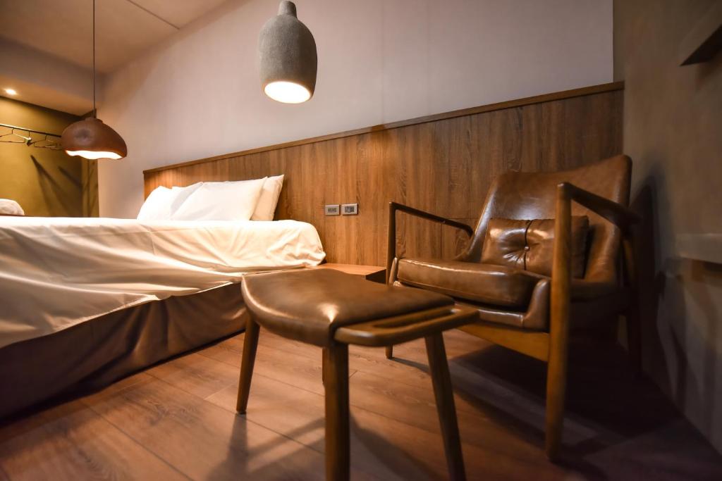 Postel nebo postele na pokoji v ubytování Two Couples Leisure Art Motel